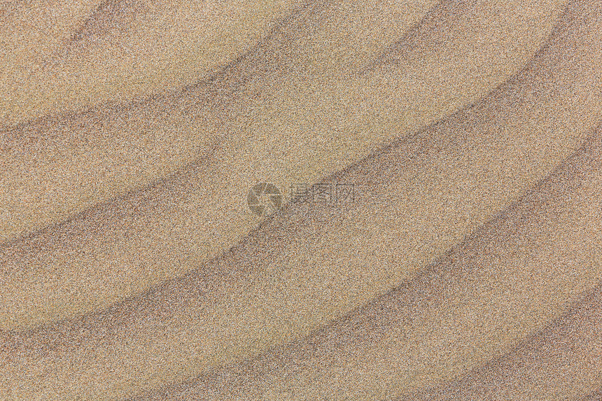 海滩上的特写沙子纹理图片