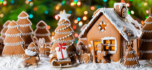 姜饼圣诞树姜饼屋圣诞树礼物动物饼干寒假庆祝姜饼屋树背景
