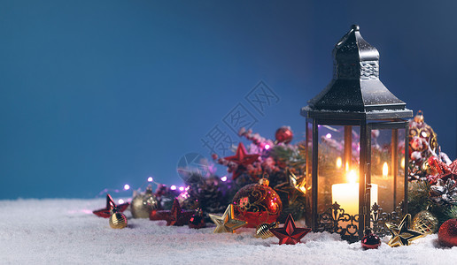 灯笼红色金色的圣诞装饰雪的蓝色背景灯笼圣诞装饰图片