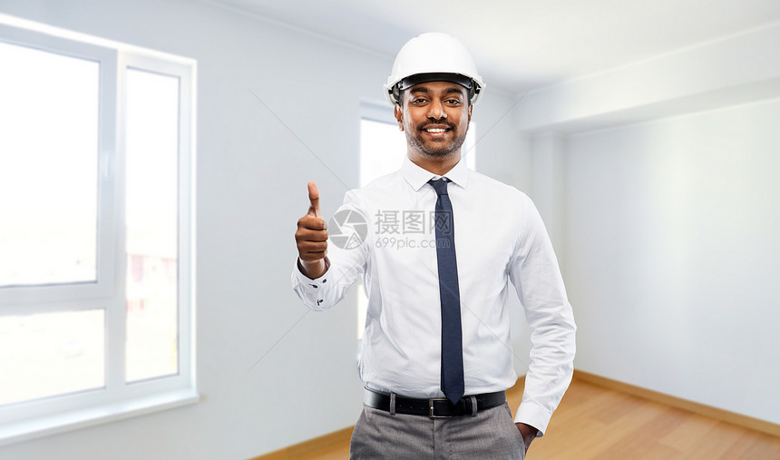 建筑,建筑业务人的微笑的印度男建筑师头盔大拇指空的新公寓房间背景戴头盔的印度男建筑师竖起大拇指图片