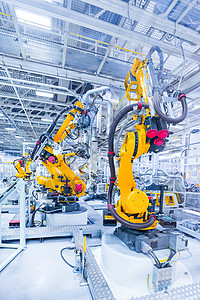 汽车工厂的机器人手臂汽车厂的机器人背景图片