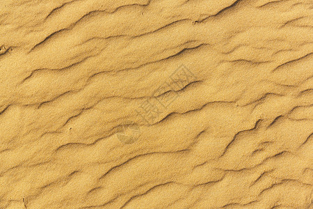 海滩上的特写沙子纹理米色高清图片素材