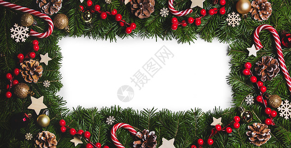 红色圣诞节边框圣诞边框的树枝白色背景与隔离,红白装饰,浆果,星星,锥圣诞树树枝的圣诞框架背景