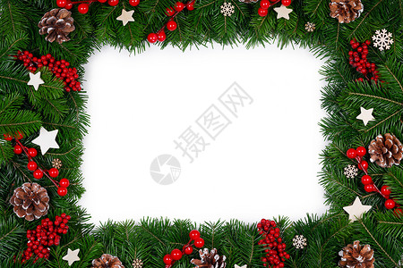 红色圣诞节边框圣诞边框的树枝白色背景与隔离,红白装饰,浆果,星星,锥圣诞树树枝的圣诞框架背景