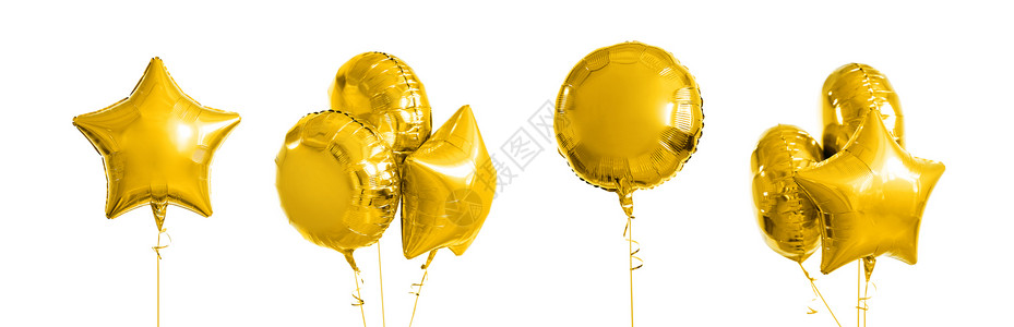 节日生日派装饰许多同形状的金属金氦气球白色背景许多金属金氦气球白色背景图片