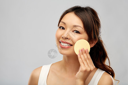 美丽,人护肤品的轻的亚洲妇女用角质海绵清洁部亚洲女用角质海绵清洁部图片