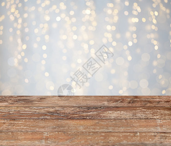 假日空木桌子与诞节金色灯光背景空木桌子诞金光图片