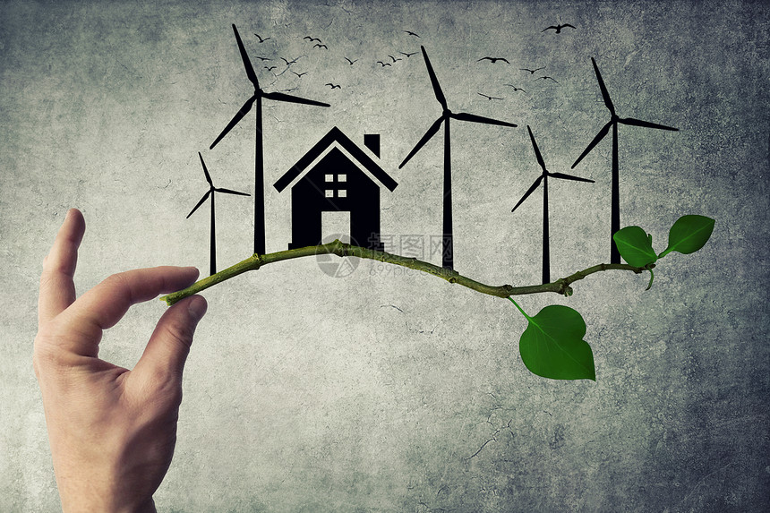 人的手着树枝环境绿色能源房屋风力涡轮机鸟类飞行的轮廓图片