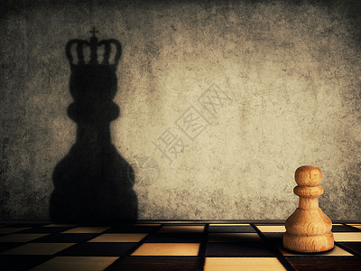 棋子荣耀,混凝土墙上投下加冕的阴影商业愿望领导理念神奇的变,成为国王背景图片