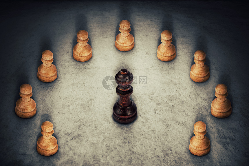 黑色皇后棋子周围的白色棋子连接他们的力量商业集领导队工作的象征图片