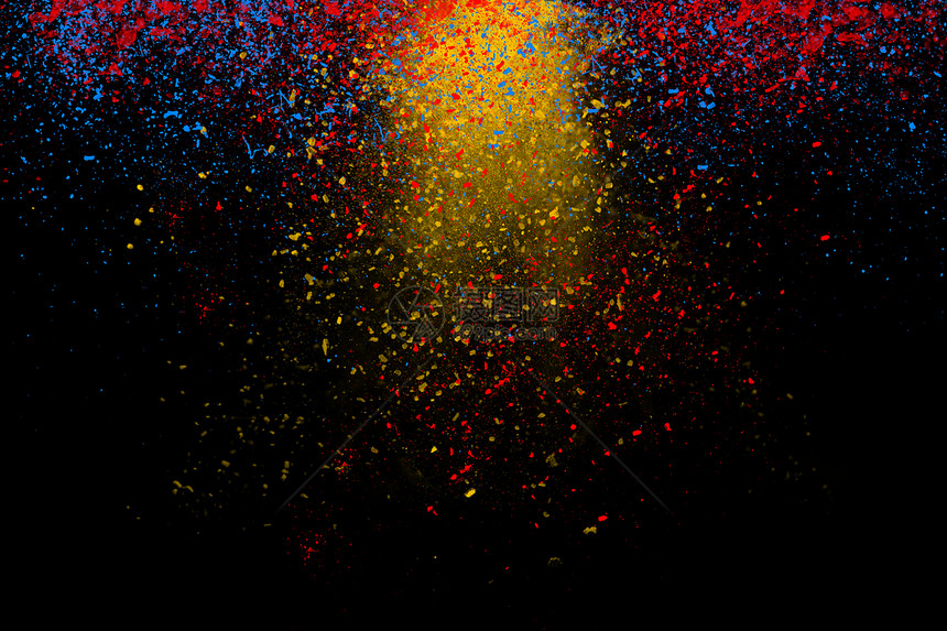 冻结运动的彩色粉末下来黑暗黑色背景黄色蓝色红色灰尘的抽象粒子云壁纸图片