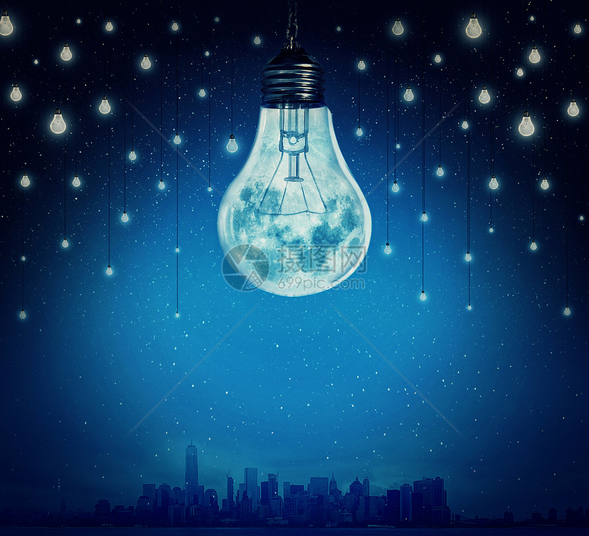 月亮星星的形状灯泡照亮了个城市超现实的背景替代能源图片