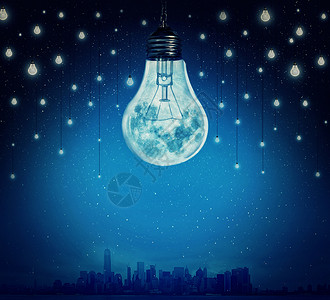 月亮星星的形状灯泡照亮了个城市超现实的背景替代能源背景图片