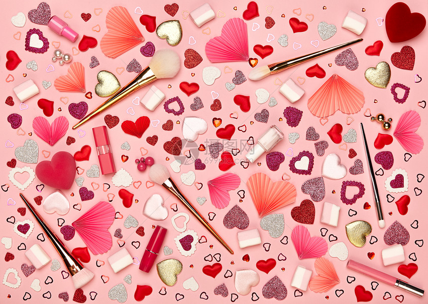 情人节背景粉红色背景上的红心平躺瓦伦丁的天壁纸化妆刷口红指甲油图片