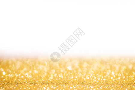 金色闪光的诞背景金色闪光的诞抽象背景与白色的图片