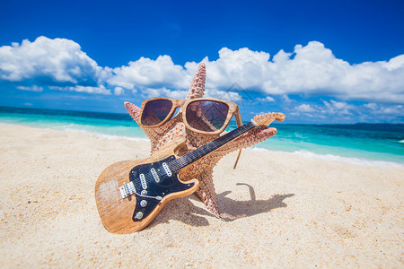 海星吉他手海滩上菲律宾热带海滩沙滩上的海星吉他手高清图片