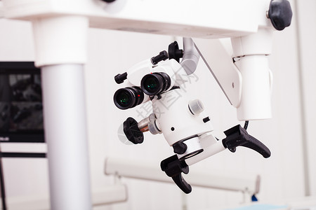 显微镜头牙科显微镜显微外科牙科办公室医学手术显微镜背景