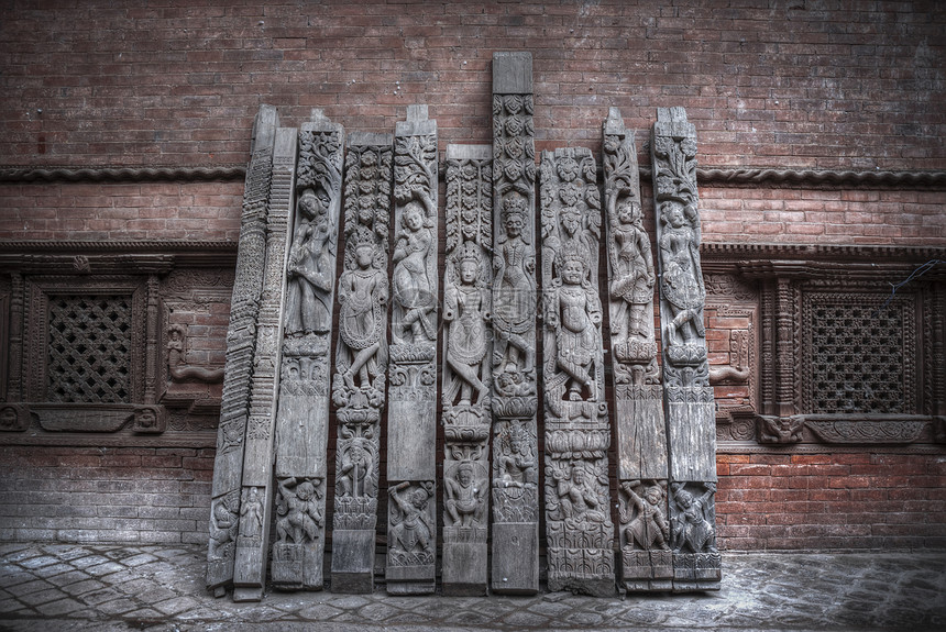 用石头木头雕刻的古代尼泊尔雕像尼泊尔的雕像图片