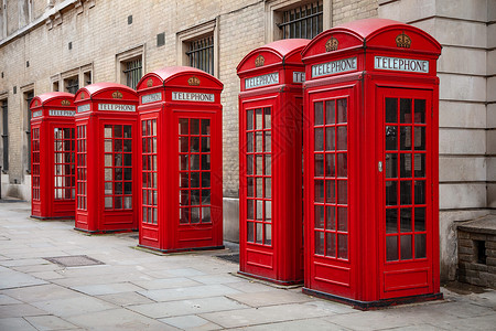五排经典的传统红色电话盒,伦敦,英国背景图片