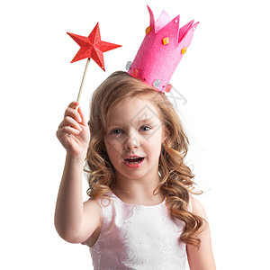 美丽的糖果公主女孩皇冠上着星星形状的魔杖,许愿糖果公主女孩带着魔杖图片