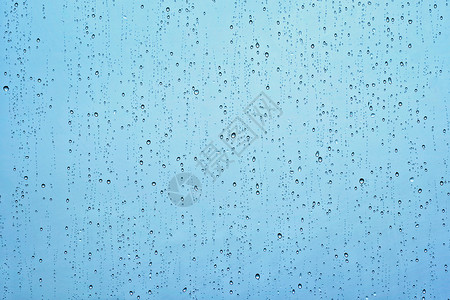 雨水滴窗户璃纹理背景上雨点落窗户上图片