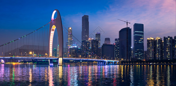 中国省级行政区广州城市景观天际线上的珠江与利德桥照亮了傍全景广州,中国广州天际线广州,中国背景