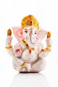 加尼莎雕像孤立白色背景与反射白色的Ganesha雕像图片