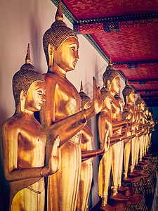 佛伦伦萨复古效果过滤了时尚风格的形象,坐佛教寺庙瓦佛,曼谷,泰国坐着佛像,泰国背景
