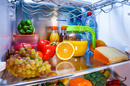 水果饮料蔬菜打开装满食物的冰箱健康的食物背景