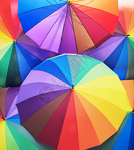 堆五颜六色生动的雨伞图片