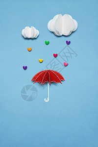 创意情人节照片伞与心雨下白色背景高清图片