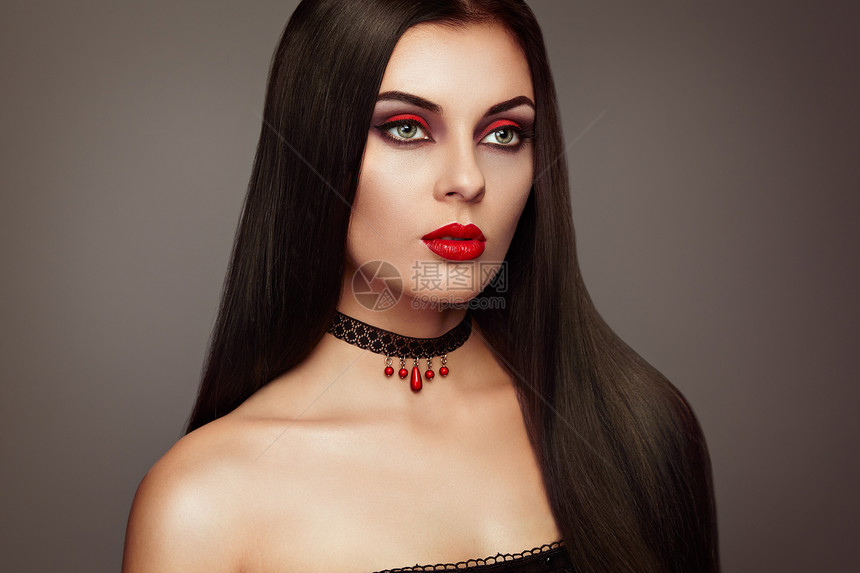 万节吸血鬼女人肖像美丽的魅力,时尚,感的吸血鬼女士,长发,美丽的化妆服装