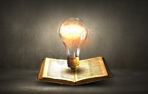 书灯泡打开的书上璃发光灯泡图片