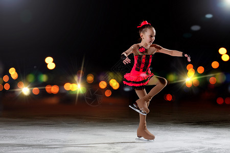 滑冰的小女孩小女孩花样滑冰小女孩运动场花样滑冰背景