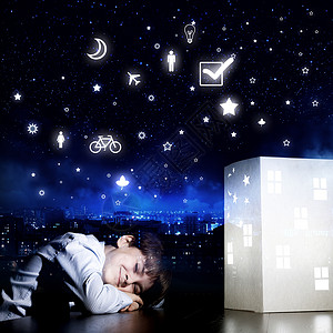 晚上梦可爱的小男孩睡觉,梦见家软的高清图片素材