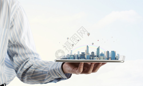 制表符现代城市模式手持平板电脑,屏幕上城市景观设计图片
