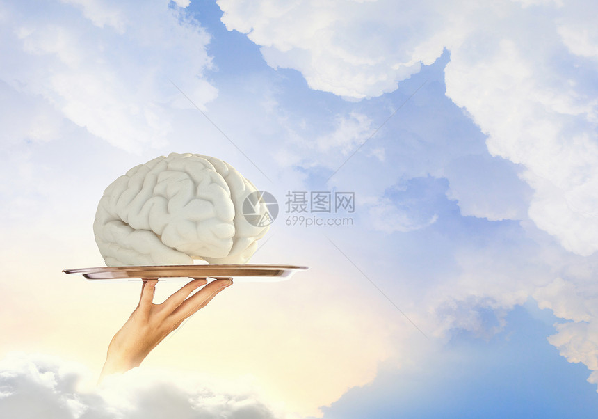 金属托盘上的大脑手金属托盘与人脑符号图片