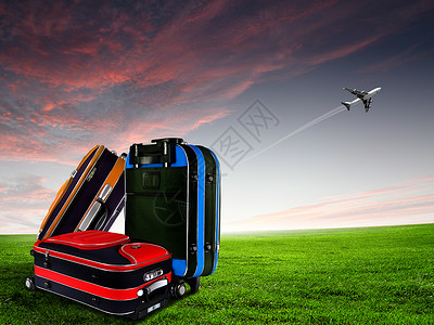 蓝色天空中的红色手提箱飞机高清图片