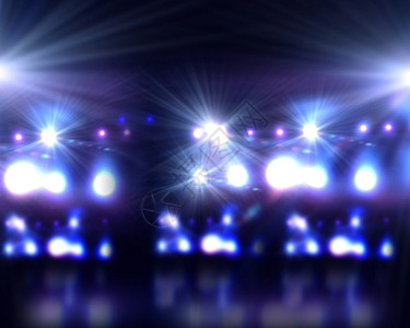 舞台灯光彩色灯光下舞台的背景图像背景图片