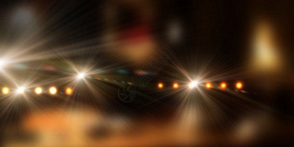 舞台灯光彩色灯光下舞台的背景图像背景图片