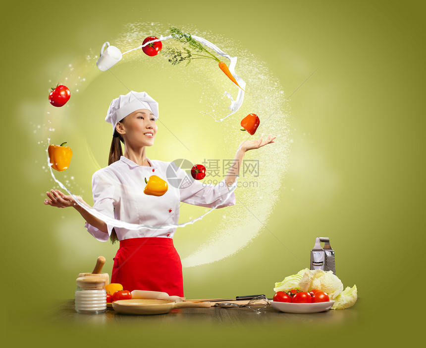 变戏法的女厨师杂耍女亚洲厨师的颜色背景图片