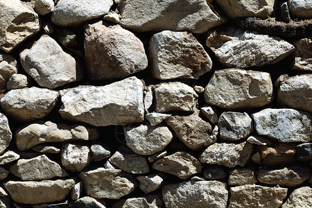 石墙的自然图案石岩纹理墙的形象背景特写黏土高清图片素材