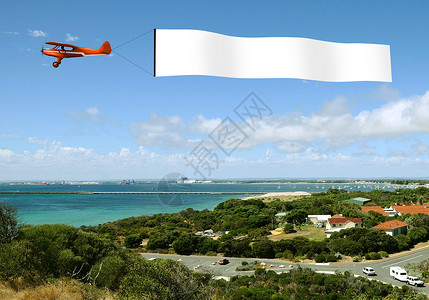 飞机拉着空白旗帜图片