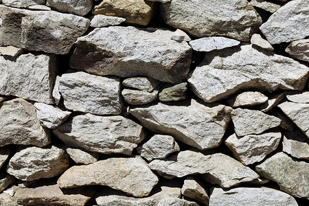 石墙的自然图案石岩纹理墙的形象背景特写棕色的高清图片素材