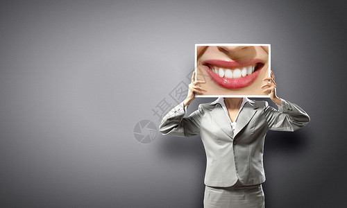 女人展示照片目全非的女商人着嘴唇的大照片背景图片