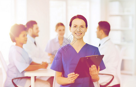 诊所,专业,人医学快乐的女医生护士与剪贴板医生会议医院图片