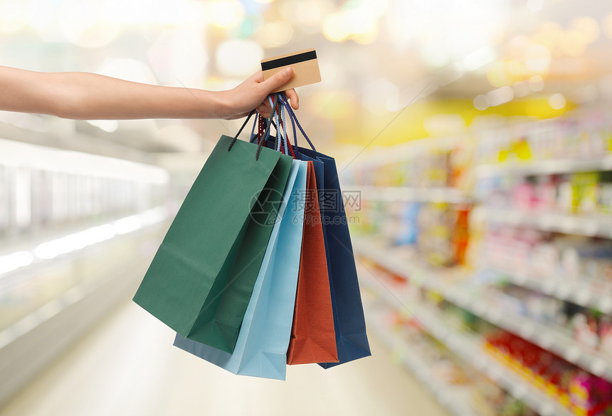 人,消费主义,金融销售与购物袋信用卡超市背景下图片