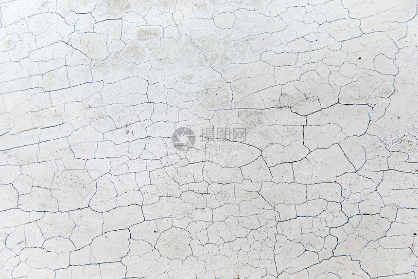 背景纹理裂缝石壁表的特写封闭开裂的石壁表图片