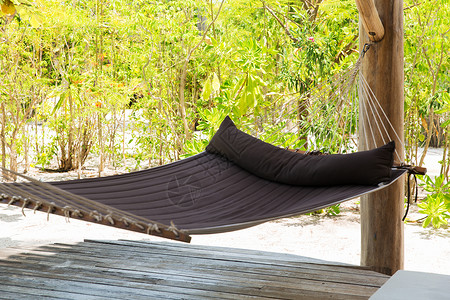 旅游旅游休闲度假暑假热带海滩露台上的大吊床热带海滩露台上吊床图片