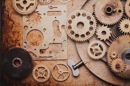 蒸汽朋克背景机械时钟的细节旧的金属背景时钟里,齿轮背景图片